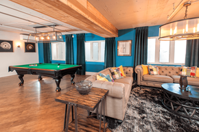 Seattle apartment for rent - A room with couched and a pool table