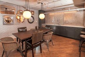 Seattle apartment for rent - A dining room with a wooden table and chairs.