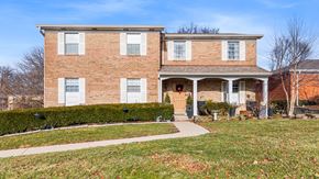Fort Wright apartment for rent - A two-story brick house with a front porch.