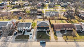 Fort Wright apartment for rent - A residential area with houses and cars.