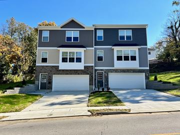 Ft Wright apartment for rent - A two-story house with a grey and white exterior.