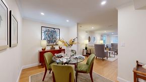 Canton apartment for rent - A dining room with a table set for four.
