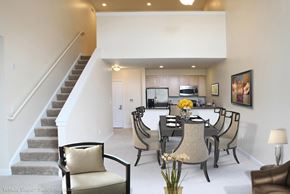Norwood apartment for rent - A dining room with a table set for six.