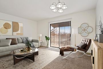 Salt Lake City apartment for rent - A modern living room with a brown and white color scheme.