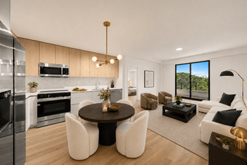 Hallandale apartment for rent - A modern kitchen with a dining table and chairs.