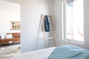 Washington apartment for rent - a bedroom with a bed and a window