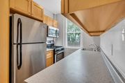 Washington apartment for rent - updated kitchen with stainless steel appliances and white quartz counter tops