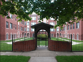 Chicago apartment for rent - the entrance to an apartment building with a wrought iron gate
