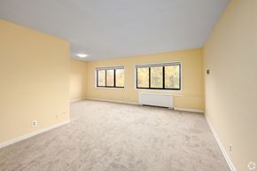 Silver Spring apartment for rent - A room with a window and a radiator on the wall.