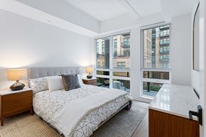 Alexandria apartment for rent - a bedroom with a bed and a large window