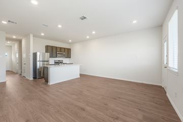 Princeton apartment for rent - A kitchen area with a refrigerator, microwave, and oven.