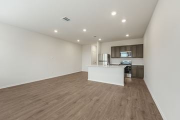 Princeton apartment for rent - A kitchen with a white counter and wooden flooring.