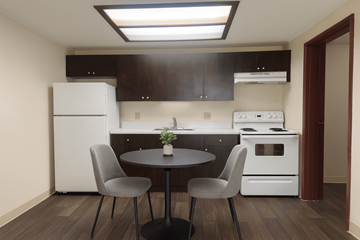 Jupiter apartment for rent - A kitchen with a table and two chairs.