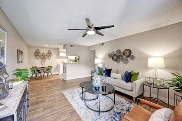 Thornton apartment for rent - A living room with a white couch and a coffee table.