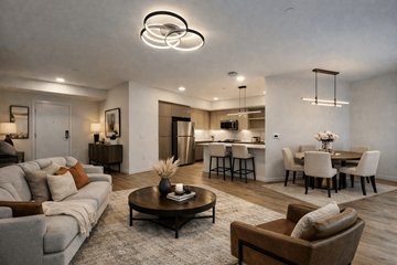 Lynnwood apartment for rent - A modern living room with a grey sofa and a coffee table.