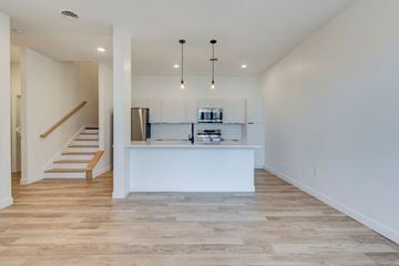 Columbus apartment for rent - A kitchen with a refrigerator, stove, and oven is shown.