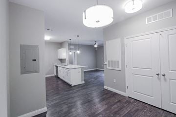 Jeffersonville apartment for rent - A kitchen area with a white cabinet and a white countertop.