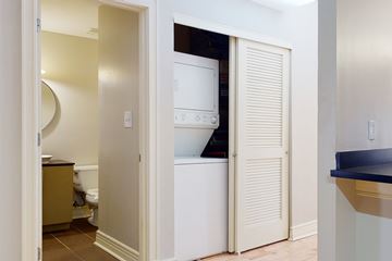 St. Louis apartment for rent - A white refrigerator is in a kitchen pantry.