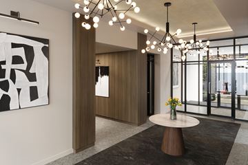 Kansas City apartment for rent - A modern living room with a large abstract painting on the wall and a chandelier hanging from the ceiling.