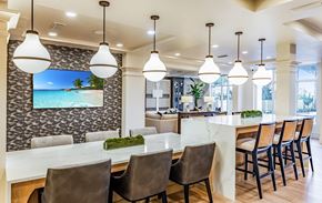 West Palm apartment for rent - a kitchen with a bar and a beach view
