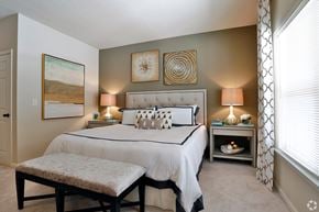 Port Wentworth apartment for rent - Inviting main bedroom with bright windows at The Columns at Coldbrook Station, Port Wentworth