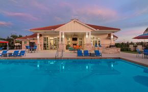 Estero apartment for rent - a house with a swimming pool in front of it