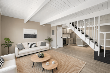 Columbus apartment for rent - A living room with a white couch and a coffee table.