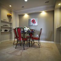 Tyler apartment for rent - A dining room with a table set for two.