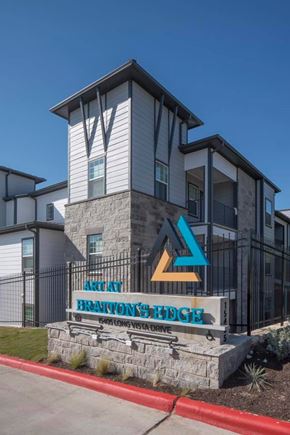 Austin apartment for rent - The image shows a building with a sign that reads "Arclay Brantons Hedge".