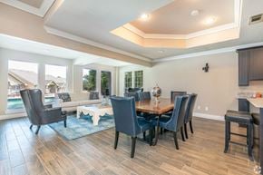 Euless apartment for rent - A dining room with a table and chairs.