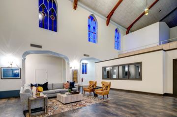 Ft Worth apartment for rent - A living room with a grey sofa and a coffee table.