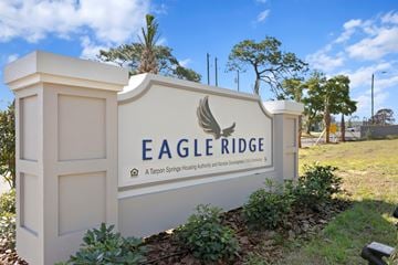 Tarpon Springs apartment for rent - A sign for Eagle Ridge reads "A Tarpon Springs Housing Authority and Town of Tarpon Springs".