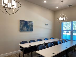 Tarpon Springs apartment for rent - A conference room with a long table and chairs.