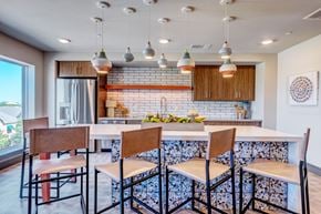Ft. Worth apartment for rent - A kitchen with a table and chairs.