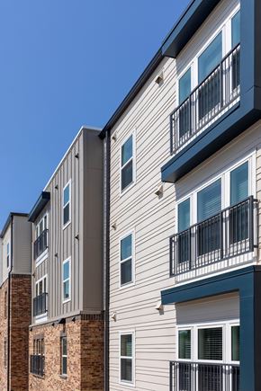 Ft. Worth apartment for rent - A modern apartment building with balconies and windows.