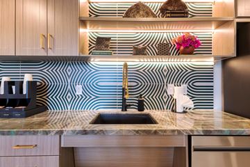 Dallas apartment for rent - A kitchen with a sink and a coffee maker.