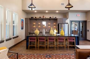 Arlington apartment for rent - A dining area with a long table and chairs.