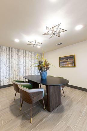 Grand Prairie apartment for rent - A dining room with a round table and chairs.