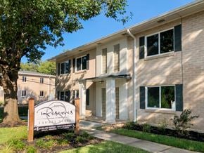 Tyler apartment for rent - A building with a sign that says "12 Reserves" in front of it.