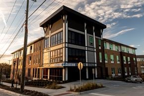 Ft. Worth apartment for rent - A large building with a sign that says "Hillcrest Apartments" on it.