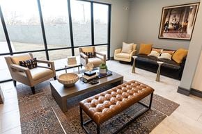 Ft. Worth apartment for rent - A living room with a large window and a view of a field.