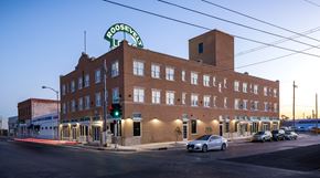 San Angelo apartment for rent - A building with a green sign that says "Roosevelt" on it.