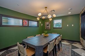 Austin apartment for rent - A dining room with a wooden table and chairs.