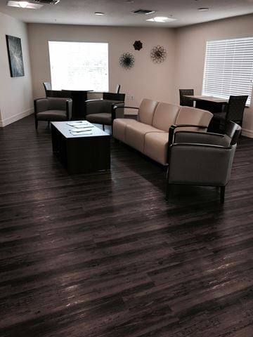 Punta Gorda apartment for rent - A living room with a couch, chairs, and a coffee table.
