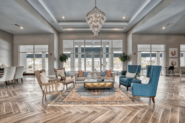 Fort Myers apartment for rent - a living room with couches and chairs and a chandelier