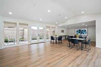 Community clubhouse with tv, living & dining area