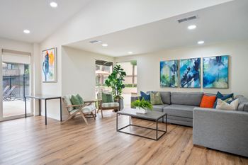 Community clubhouse with tv, living & dining area