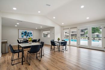 Community clubhouse with tv, living & dining area