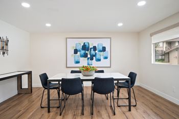 Community clubhouse with tv, living & dining area