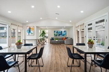 Community clubhouse with tv, living & dining area